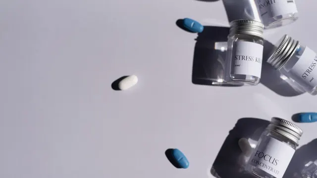 Close-up of a dog supplement bottle with a printed ingredient list