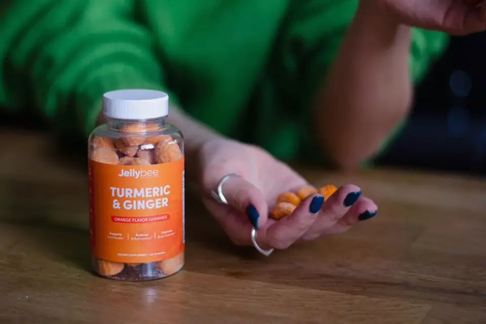 Collagen chews next to a jar of bone broth on a kitchen counter