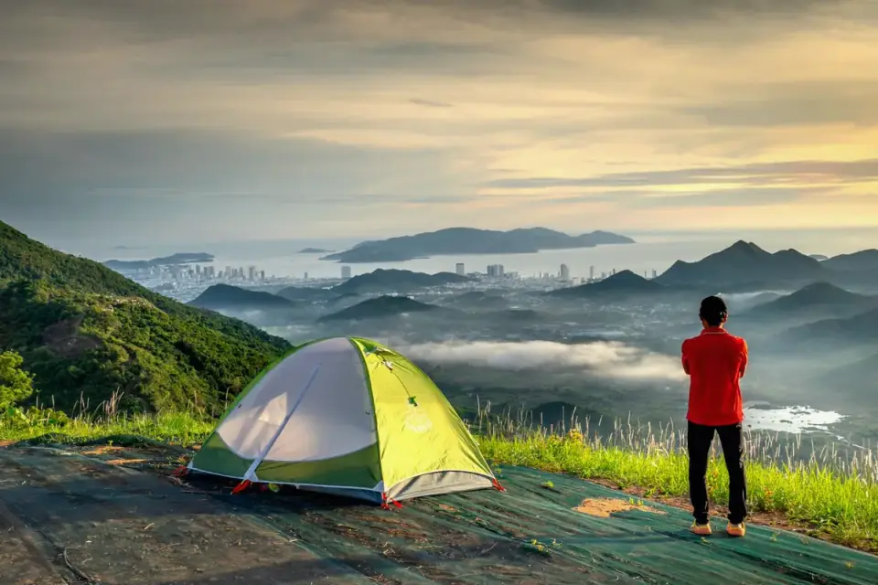 Dog camping with an owner