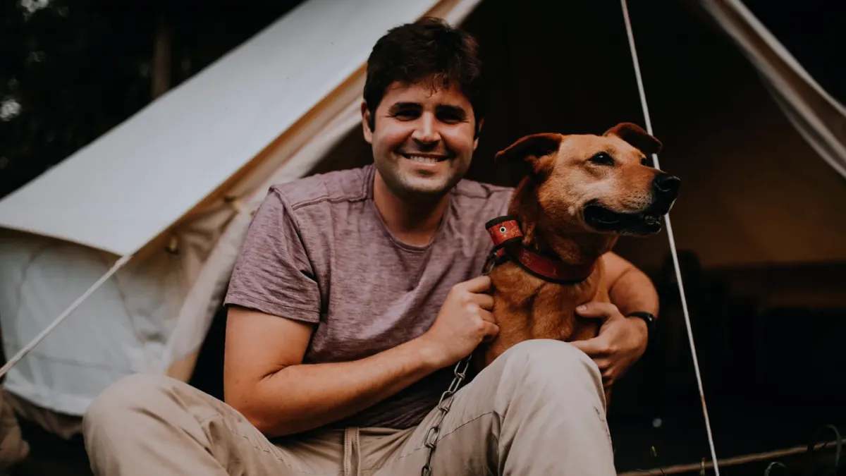 Dog camping with an owner