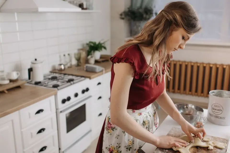 Dog owner preparing a meal